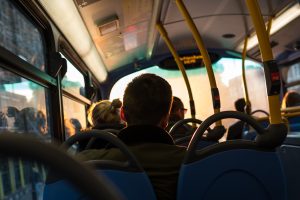 View on passangers in a public bus from behind