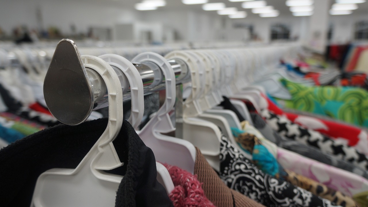 Clothes on a rack in a second-hand shop
