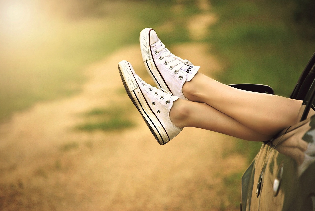 Girl wearing white sneakers