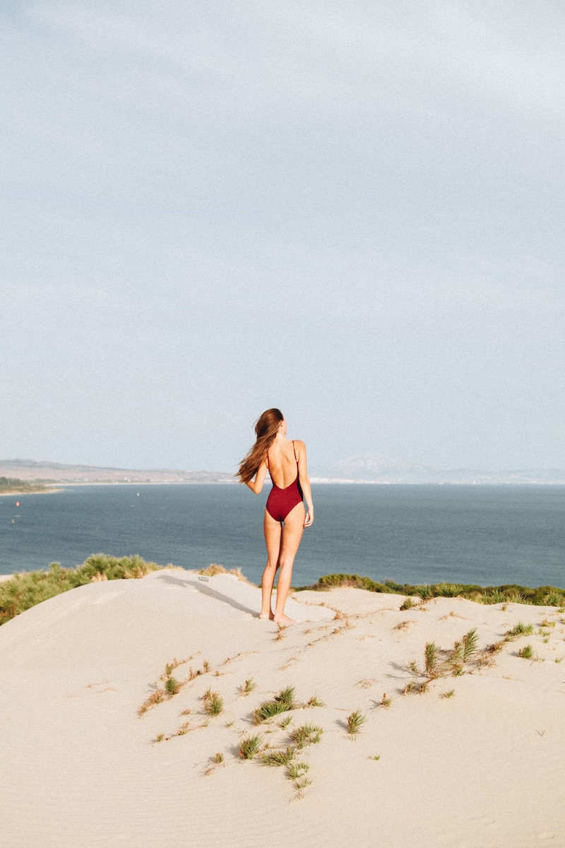 Girl on a beach in a swimsuit