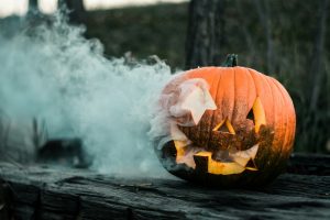 close-up of pumpkin halloween decoration with smoke