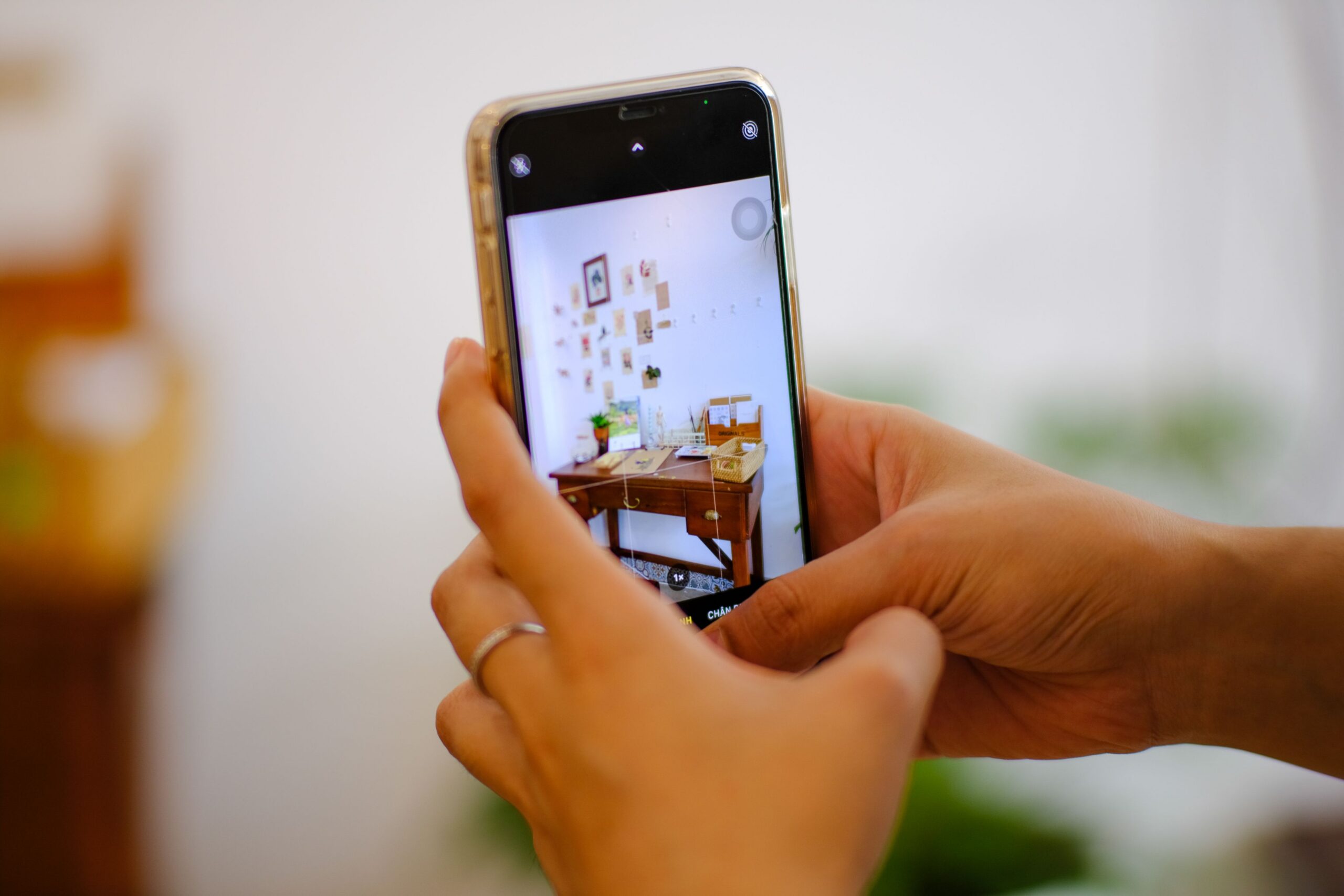 person taking a product foto to resell item secondhand